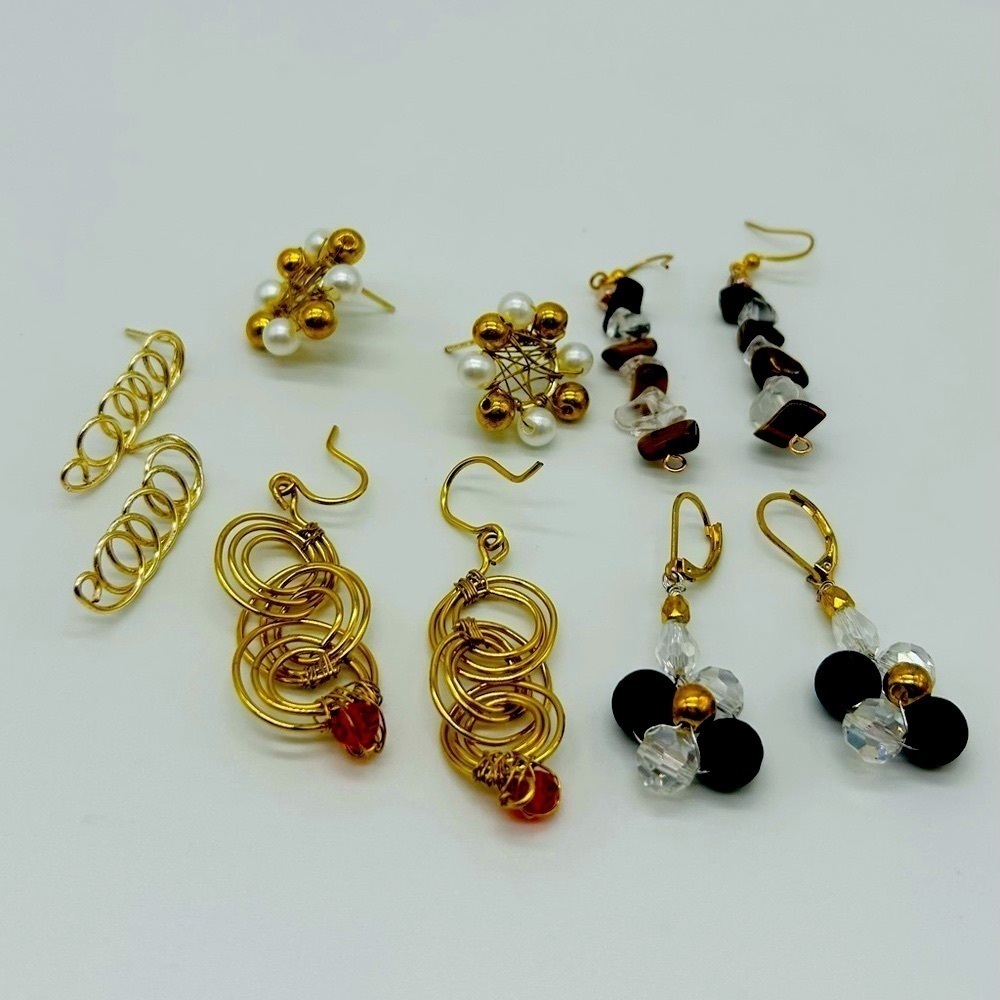 On Sale . five beautiful pairs of silver plated wired handmade earrings. New